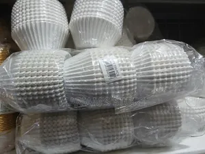 White Cupcake Liners, Packaged in Sets of 250 Pieces.