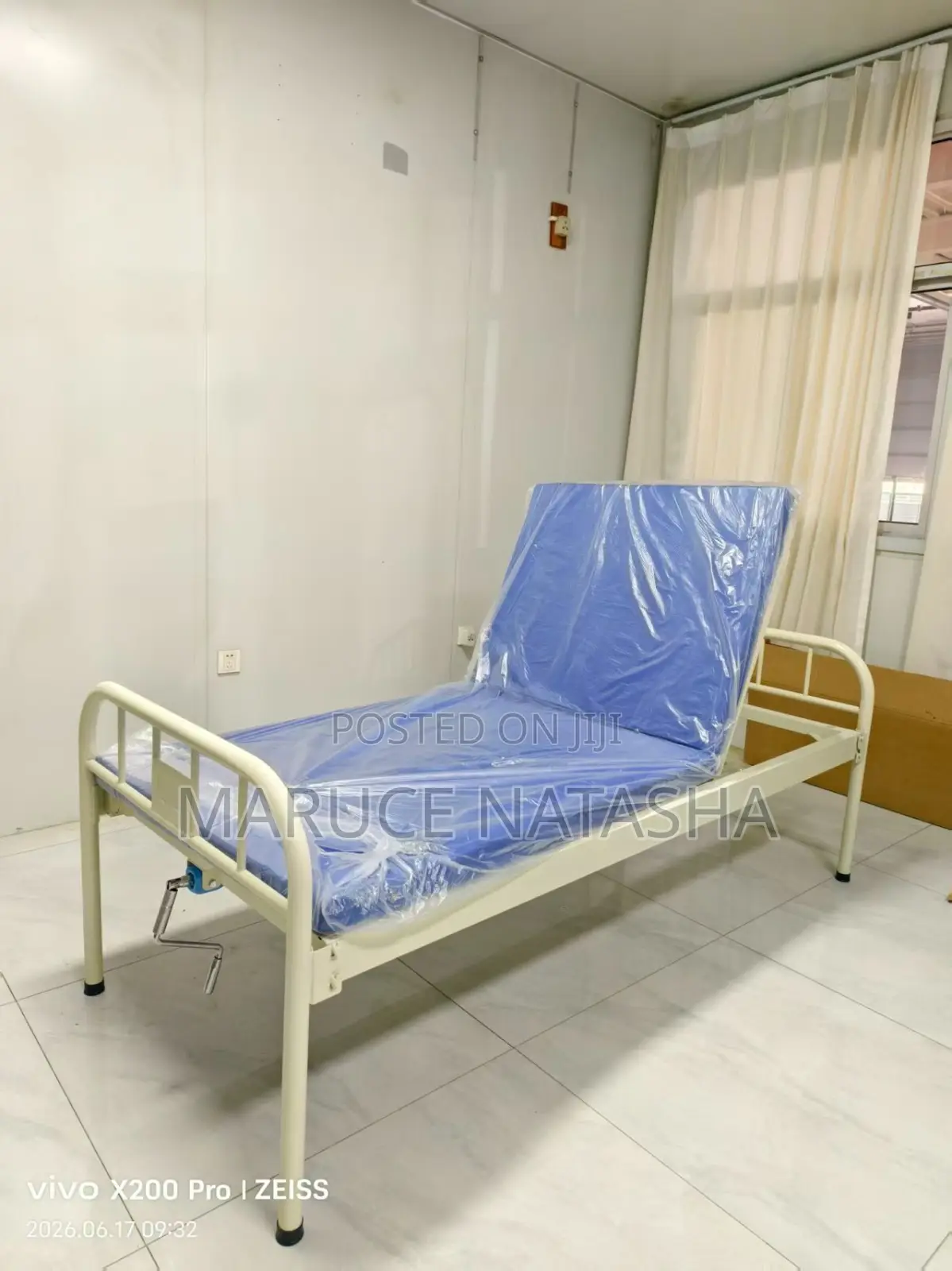 Metallic Hospital Bed With a Mattress