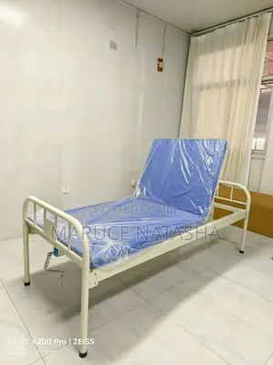 Metallic Hospital Bed With a Mattress