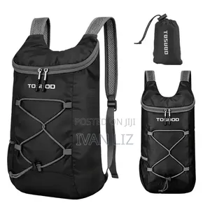 TUSUUD Black Nylon Foldable Backpack Features a Front Elastic Bungee
