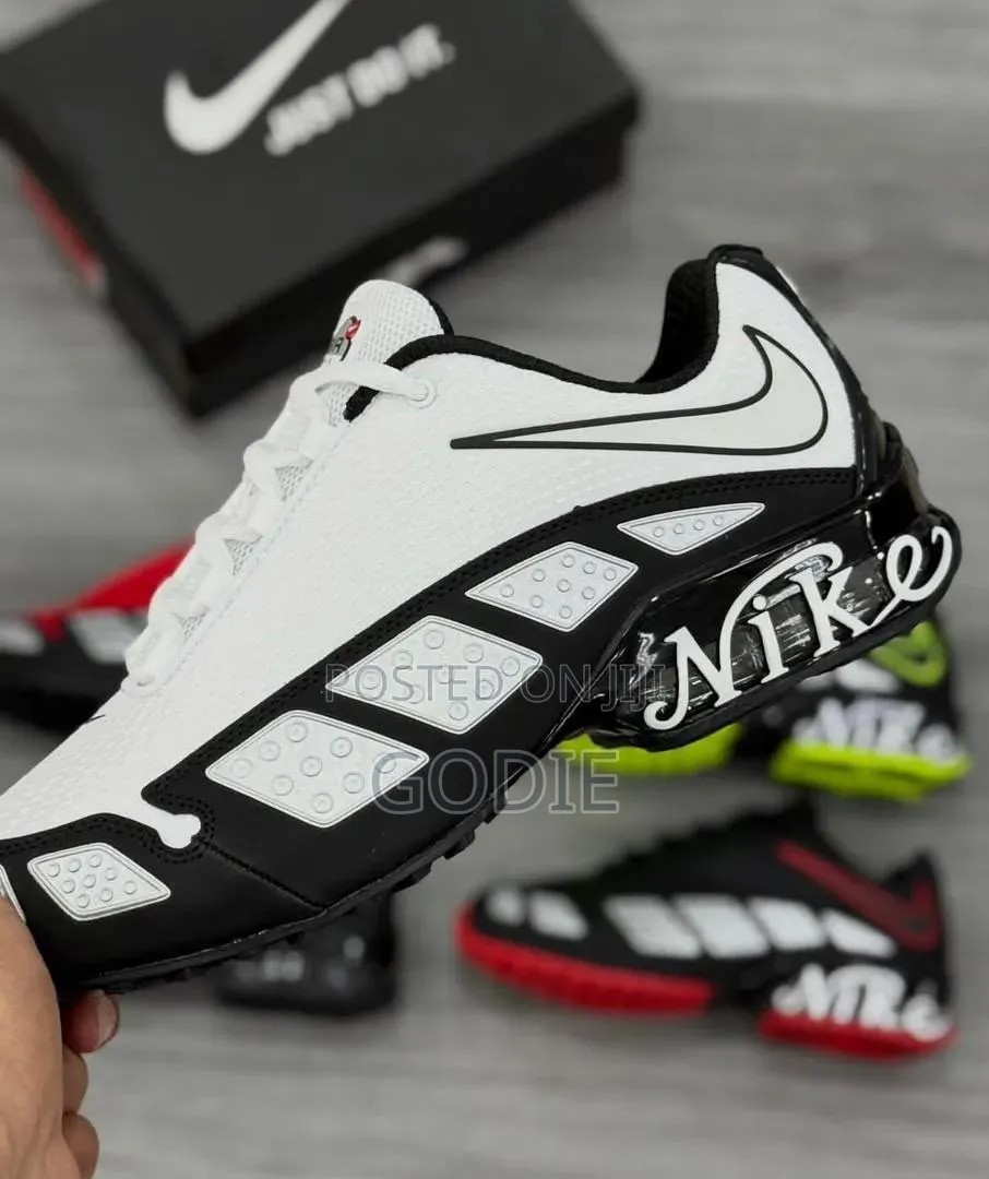 Nike Air Max TL Sneakers Featuring a White Upper, Black Overlays