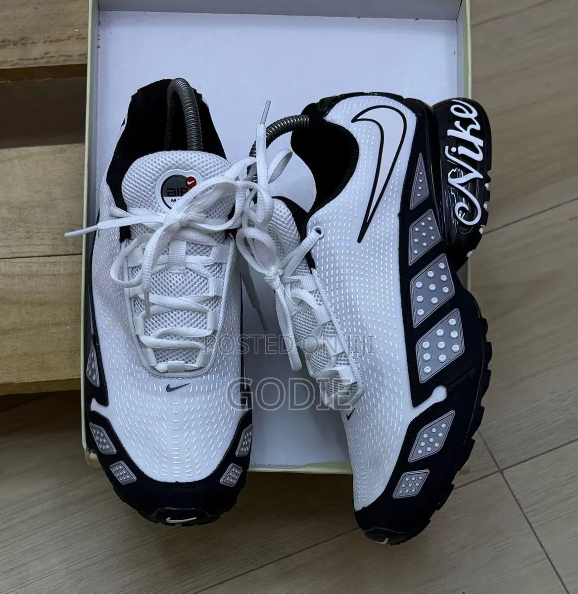 Nike Air Max TL Sneakers Featuring a White Upper, Black Overlays