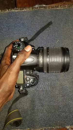 Nikon D7000 Bag Is Free and Battery Charger and One Lenses