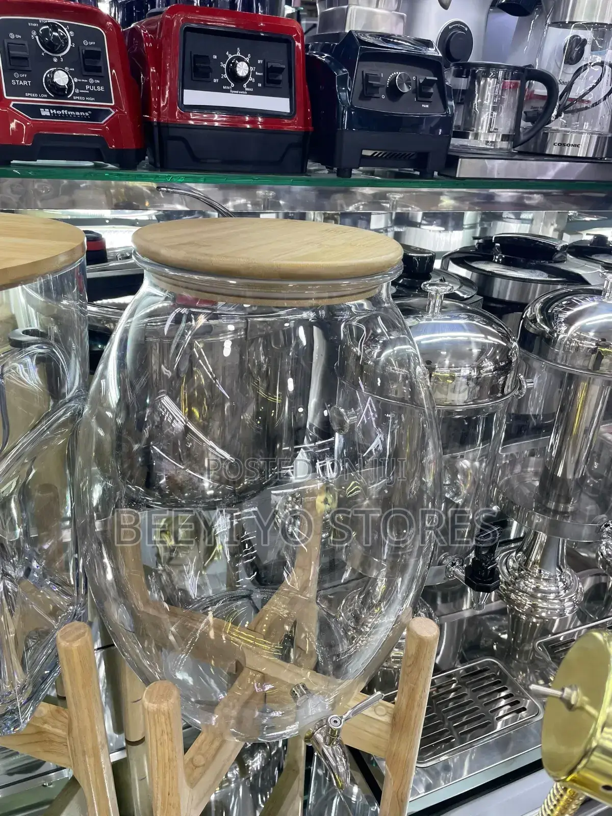 Large Glass Beverage Dispenser With Wooden Lid and Stand.