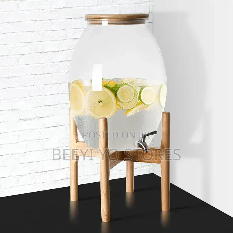 Large Glass Beverage Dispenser With Wooden Lid and Stand.