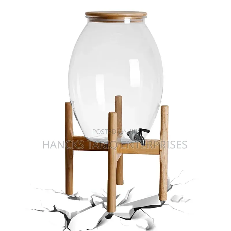 Large Glass Beverage Dispenser With Wooden Lid and Stand.