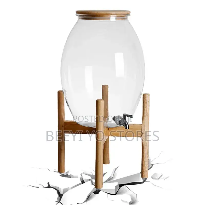 Large Glass Beverage Dispenser With Wooden Lid and Stand.