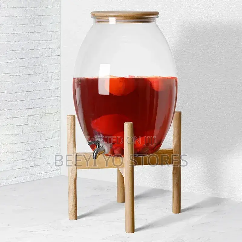 Large Glass Beverage Dispenser With Wooden Lid and Stand.