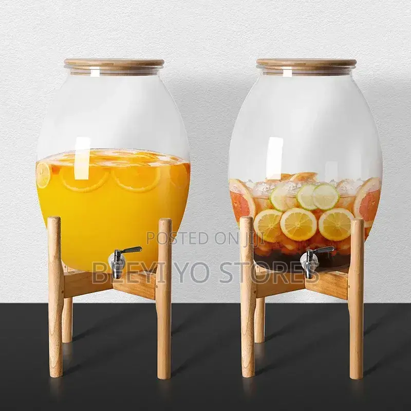 Large Glass Beverage Dispenser With Wooden Lid and Stand.
