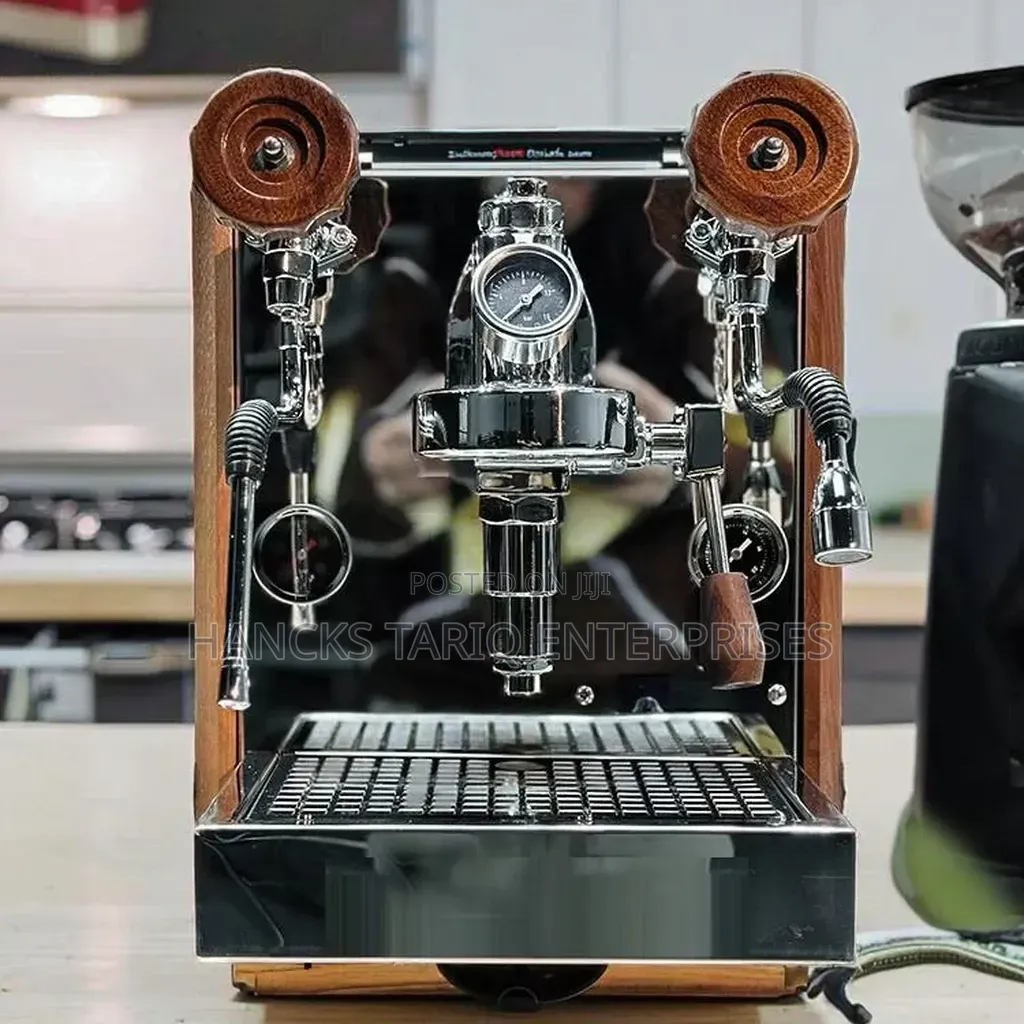 Countertop Espresso Machine With Dual Steam Wands and Wood Accents.