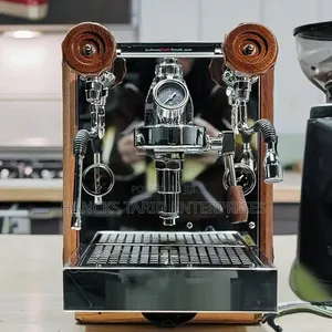Countertop Espresso Machine With Dual Steam Wands and Wood Accents.