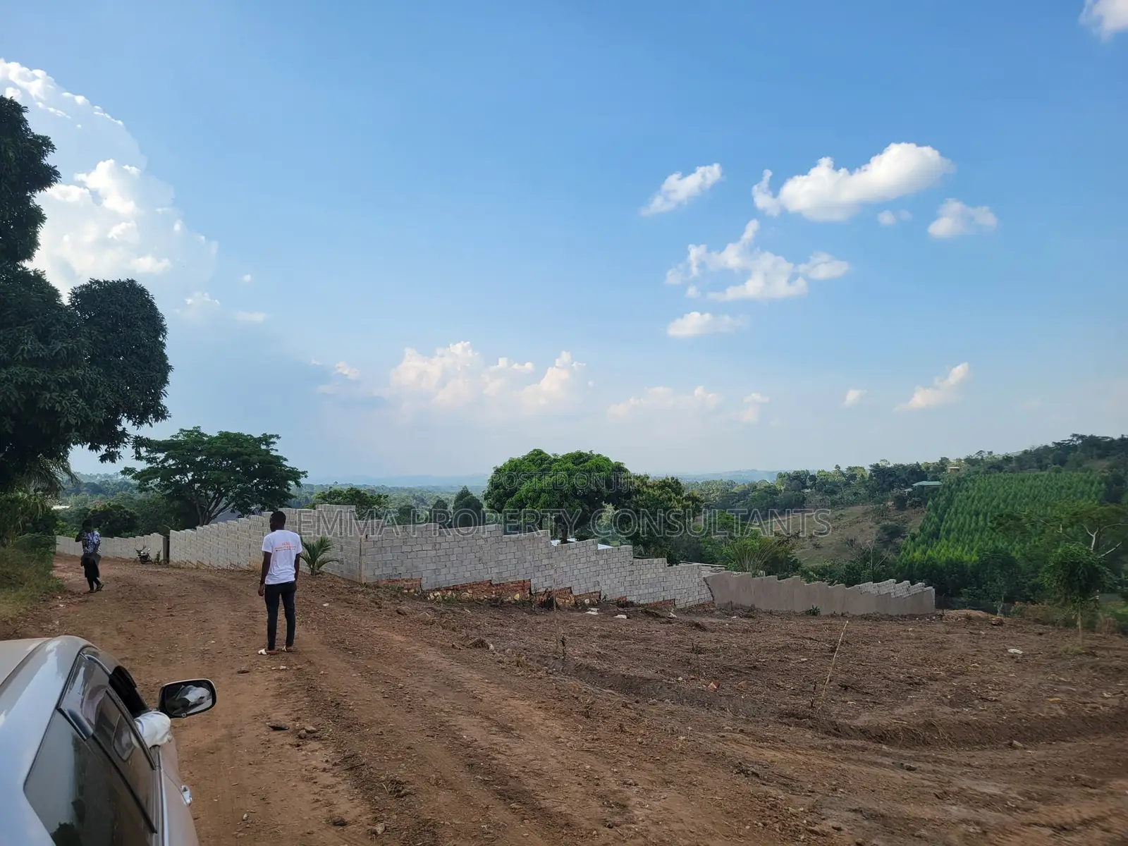 *Namayumba-Busamba Estate 100by50fts at 10m Private Mailoland Title*