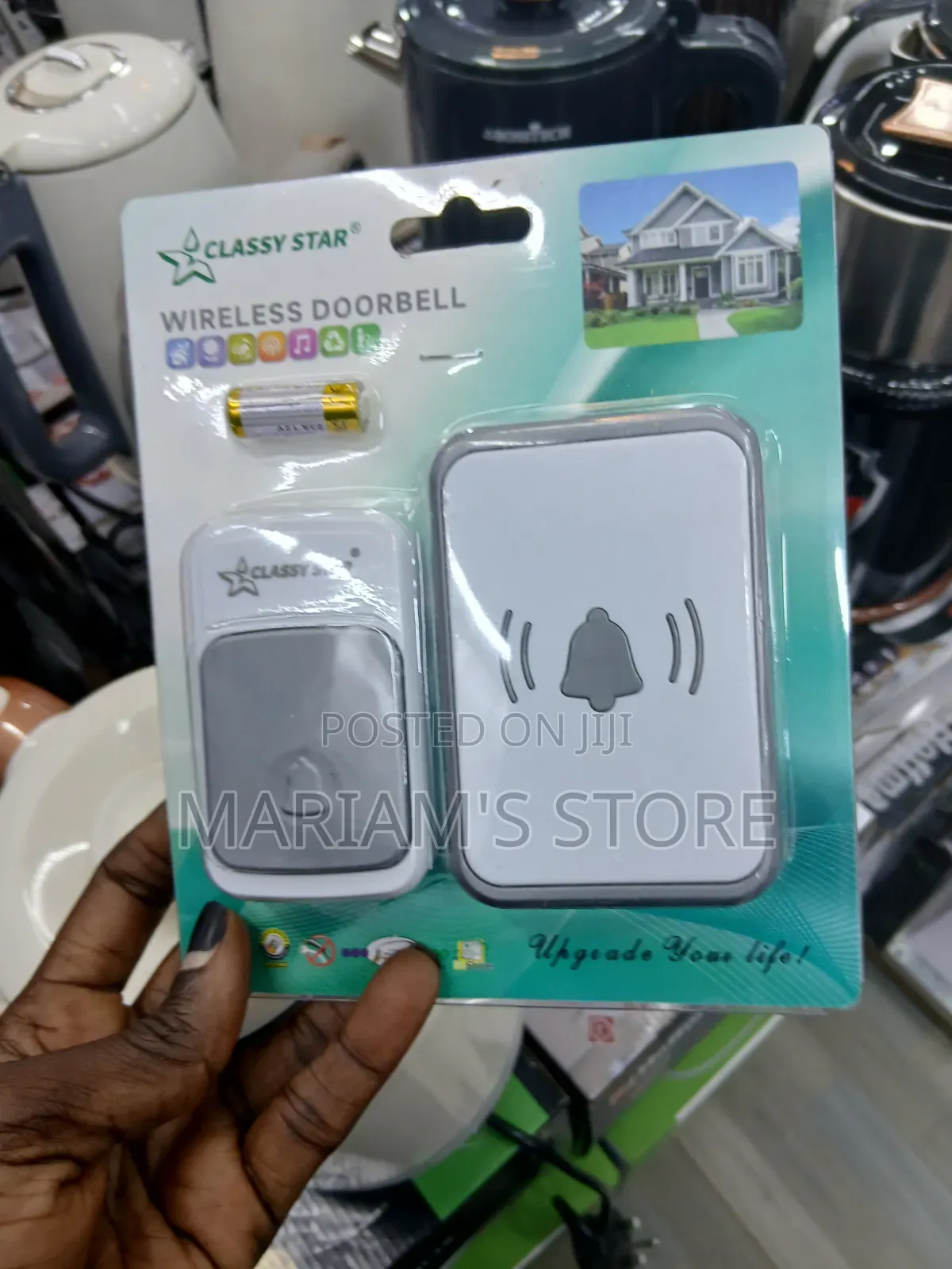 Wireless Doorbell Kit Featuring a White and Grey Transmitter Button.