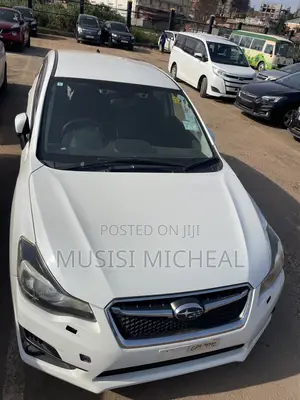 Subaru Impreza 2.0i Limited PZEV 4dr Hatchback AWD (2.0L 4cyl CVT) 2015