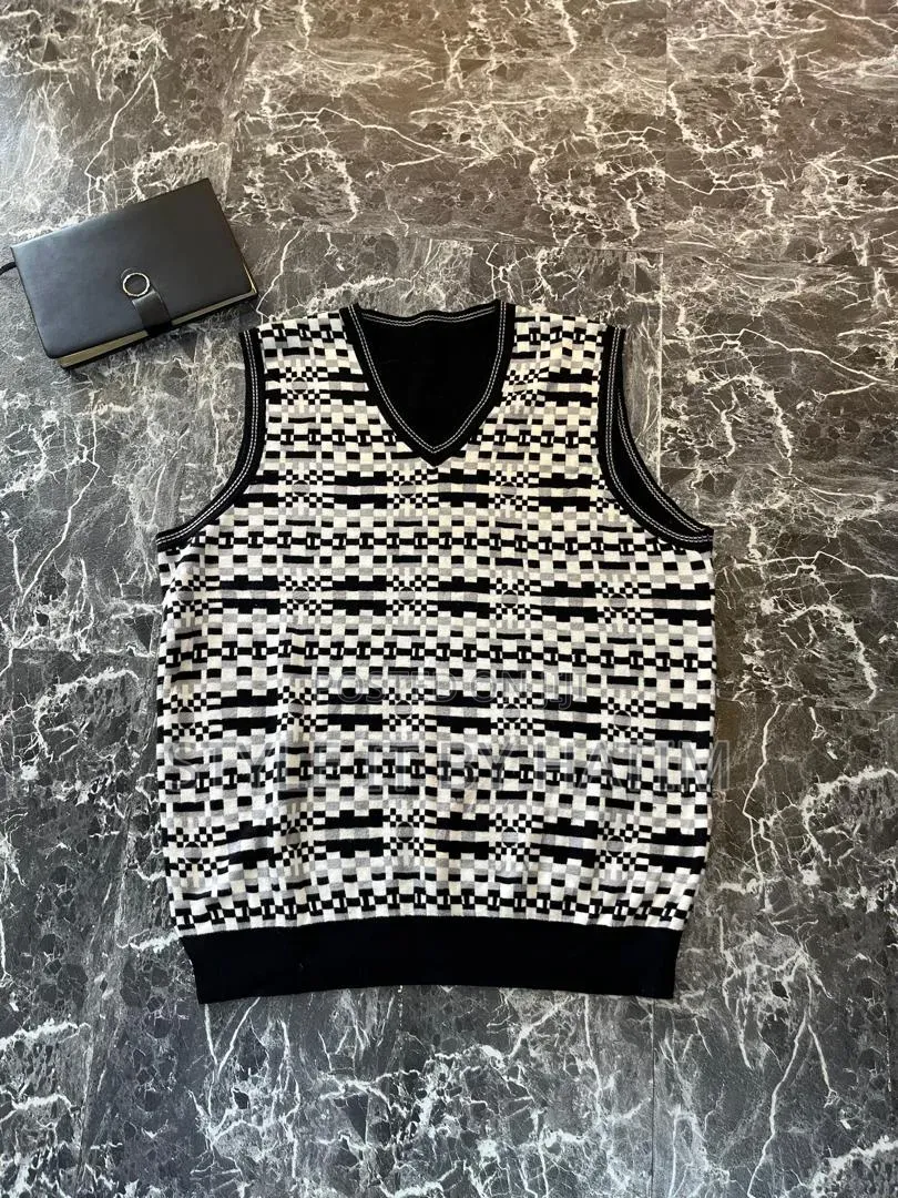 Armless Sweaters and Quarter Zippers