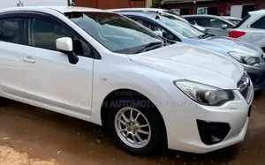 Subaru Impreza 2.0i Limited PZEV 4dr Hatchback AWD (2.0L 4cyl CVT) 2014