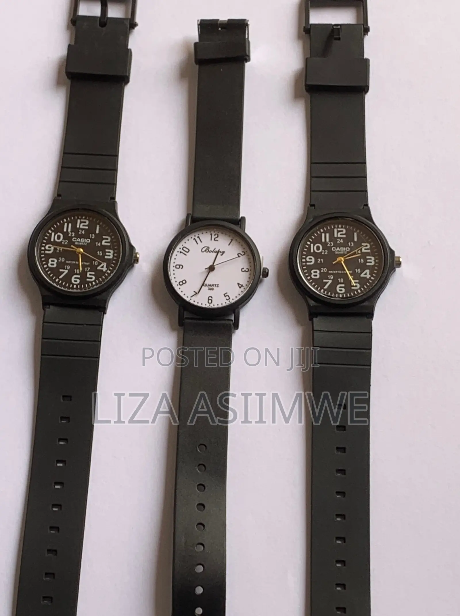 Black Casio MQ-24 Series Watches and a White Bolang Analog Watch