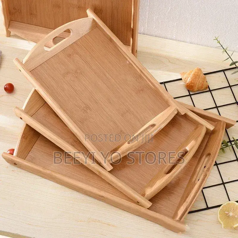 Set of Nested Wooden Serving Trays.
