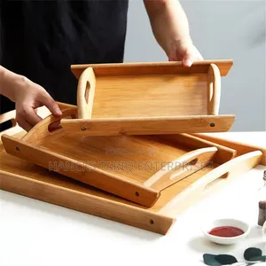 Set of Nested Wooden Serving Trays.