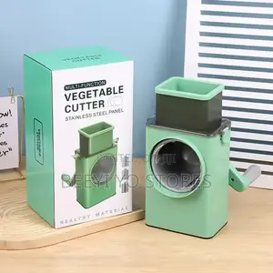 Multi-Function Rotary Vegetable Cutter / Grater .
