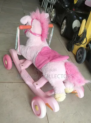 UK Used Pink Disney Princess Plush Rocking Pony for Children.