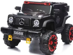 Black Licensed Mercedes-Benz Kids Ride and a Rechargeable 12V Battery.