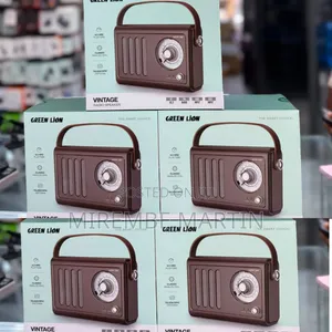 Green Lion Vintage Radio Speaker, Featuring a Retro Design With a Brow