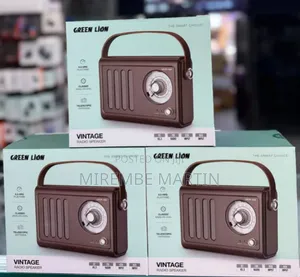 Green Lion Vintage Radio Speaker, Featuring a Retro Design With a Brow