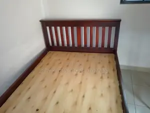 4 by 6 Strong Bed and Mattress for Sale in Good Condition at Lubowa