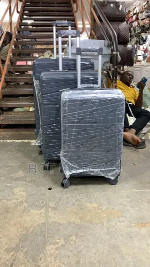 3pcs Set of Waterproof Rubber Suitcases (S,M,L) (Color Varies )