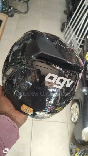 UK Used AGV Motorcycle Helmet in Glossy Black.