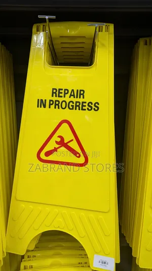 Repair in Progress Sign Post