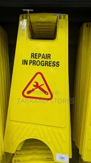 Repair in Progress Sign Post