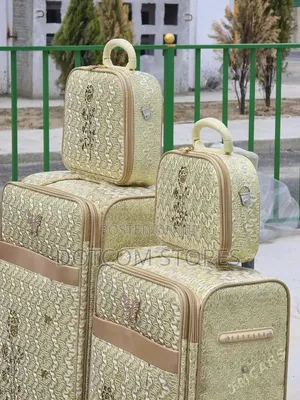 Beige and Gold Monogram Traveling Luggage Set
