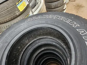 265 70 R15 Dunlop Grand Trek AT Used Bt Still Gd Tires and Its a Set.