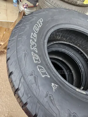 265 70 R15 Dunlop Grand Trek AT Used Bt Still Gd Tires and Its a Set.