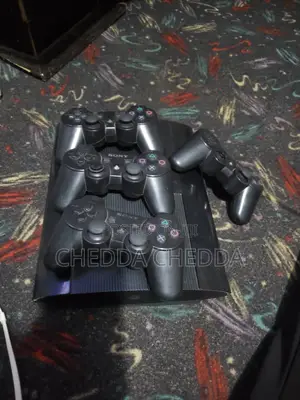 Play Station 3 With 4 Pads and 9 Games