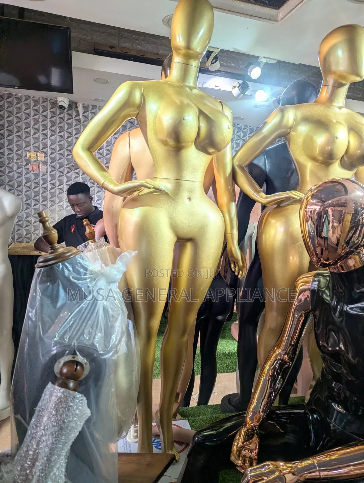 Mannequin Features a Glossy Gold Finish
