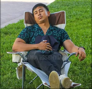 Folding Camping Chair Features a Built-in Footrest