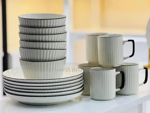 Ribbed Cream Ceramic Dinner Set Featuring Delicate Black Trim Lines,