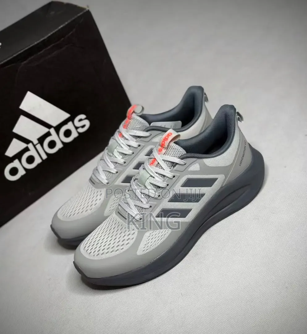 Adidas Lightmotion Go Voeuy Running Shoes in a Light Grey