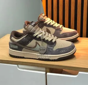 Nike SB Dunk Low Fear of God and Evisu.