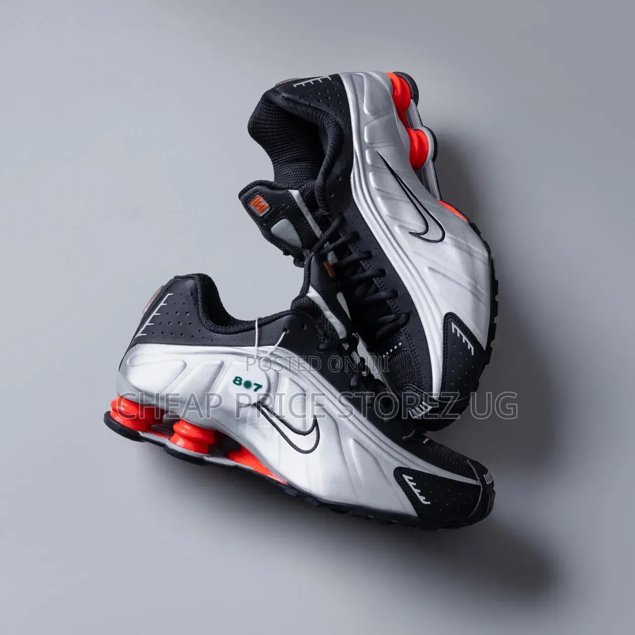 Nike Shox R4 in the "Black/Metallic Silver-Bright Crimson" Colorway,