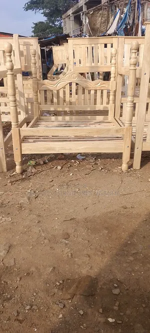 5 by 6 Plain Wooden/Varnished Bed