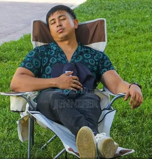 Folding Camping Chair Features a Built-in Footrest