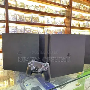 PS4 Slim Consoles. UK USED Chipped PS4 Slim With 12 Games and 2 Pads