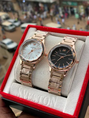 Displays a Swarovski Women's Rose Gold-Tone Wristwatch