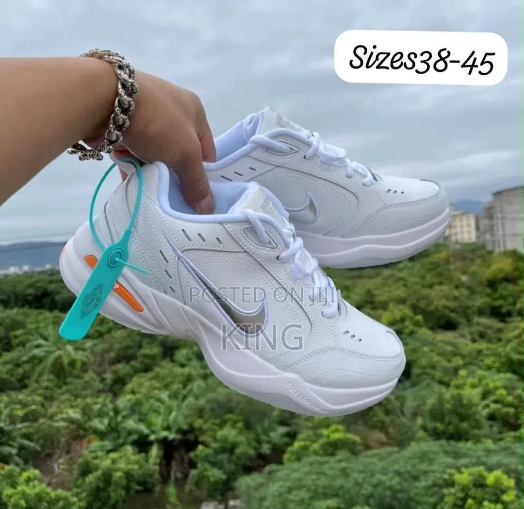 Nike Air Monarch IV "Snow Day" Walking Shoes. Clean White