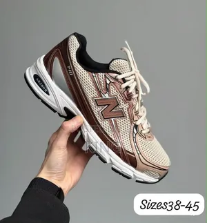 New Balance 740 Sneakers in a Rich Oak and Bisque