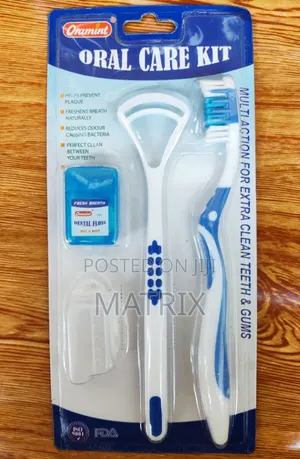 Oral Care Kit With a Blue and White Toothbrush.